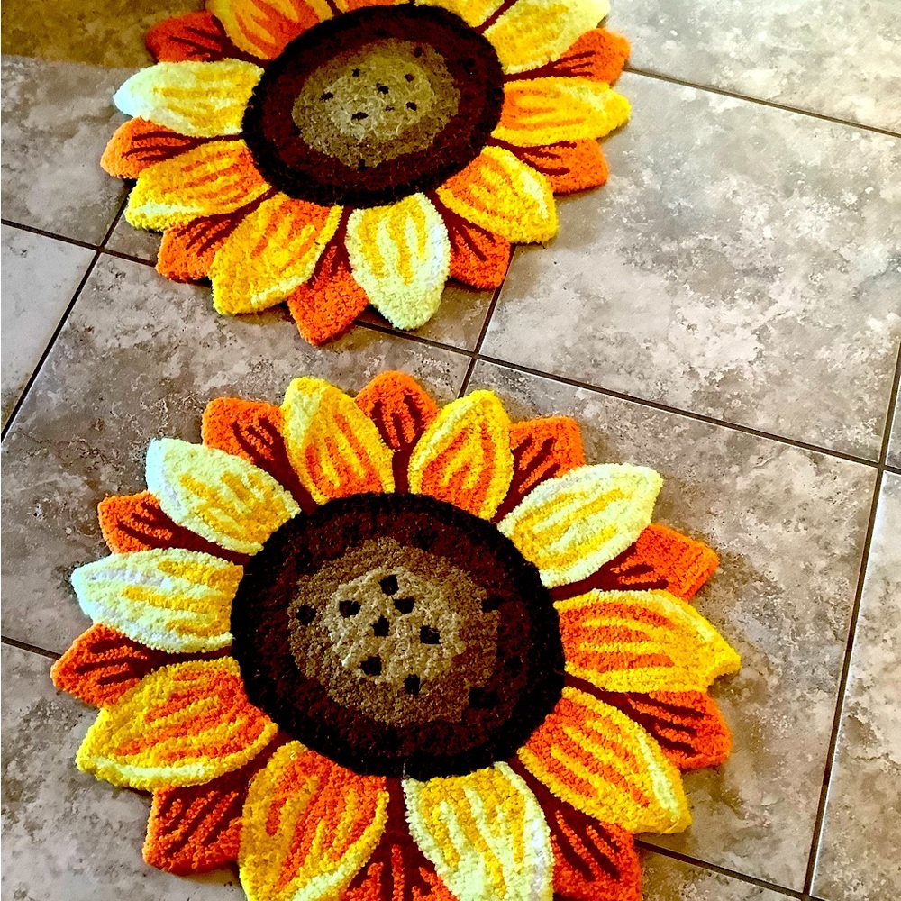 Two Sunflower Rugs.
